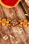 Nayaab by Aleezeh_Red Stone Temple Motif Rakhi_Online_at_Aza_Fashions