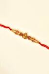 Shop_Nayaab by Aleezeh_Red Stone Temple Motif Rakhi_at_Aza_Fashions