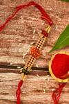 Buy_Nayaab by Aleezeh_Red Stone Temple Motif Rakhi_at_Aza_Fashions