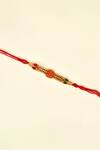 Shop_Nayaab by Aleezeh_Red Stone Temple Motif Rakhi_at_Aza_Fashions