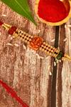 Nayaab by Aleezeh_Red Stone Temple Motif Rakhi_Online_at_Aza_Fashions