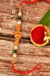 Buy_Nayaab by Aleezeh_Red Stone Temple Motif Rakhi_at_Aza_Fashions