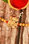 Nayaab by Aleezeh_Gold Stone Temple Motif Rakhi_Online_at_Aza_Fashions