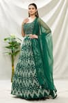 Buy_Samyukta Singhania_Green Raw Silk Printed And Embroidered Bandhani Round Neck Lehenga Set _at_Aza_Fashions