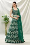 Samyukta Singhania_Green Raw Silk Printed And Embroidered Bandhani Round Neck Lehenga Set _Online_at_Aza_Fashions