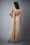 Shop RI.Ritu Kumar Gold 100% Polyester, Lining 100% Viscose Satnam Pre-draped Saree And Blouse at Aza Fashions Shop_RI.Ritu Kumar_Gold 100% Polyester, Lining 100% Viscose Satnam Pre-draped Saree And Blouse_at_Aza_Fashions