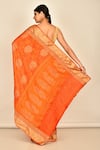 Shop_Nazaakat by Samara Singh_Orange Silk Woven Floral Saree_at_Aza_Fashions