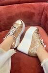 Buy_Tiesta_Gold Suede Begum Embroidered Sneaker Wedges_at_Aza_Fashions
