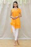 Buy_Megha Garg_Orange Crepe Plain Asymmetric Draped Tunic _at_Aza_Fashions