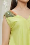Megha Garg_Green Crepe Sequins V Neck Placement Embroidered Flared Top _at_Aza_Fashions