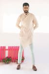 Buy_Vaani Beswal_Peach Handwoven Cotton Coco Asymmetric Overlap Kurta _at_Aza_Fashions