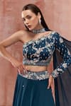 Shop_Suruchi Parakh_Blue Georgette Crepe Embroidered Floral Motifs One Shoulder Layered Skirt Set _Online_at_Aza_Fashions