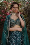 Buy_Irrau by Samir Mantri_Green Net Embroidered Sequins Sweetheart Neck Floral Bridal Lehenga Set _Online_at_Aza_Fashions