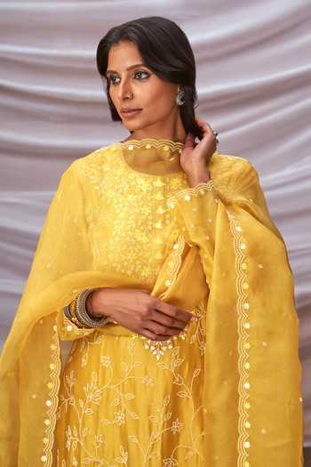 Dark Mauve Silk Chanderi kurta set with all-over Pink & Yellow floral hand-block print and side panels.