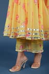 Pomcha Jaipur_Yellow Organza, Cotton Tassels Round Neck Flora Print Anarkali Pant Set _at_Aza_Fashions