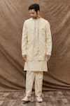 Buy_Aham-Vayam_Cream Cotton Blend Geometric Sunahra Pattern Bundi And Kurta Set _at_Aza_Fashions