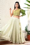 YUVRAANI JAIPUR_Ivory Silk Embroidery Chevron Asymmetric Print Lehenga With Blouse _Online_at_Aza_Fashions