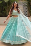 Buy_Amrin khan_Blue Raw Silk Embroidered Mirror Work V Neck Ornamented Ombre Lehenga Set _at_Aza_Fashions