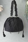 Buy_Amyra_Black Embroidery, Tassels Kohl Silk Bucket Bag _at_Aza_Fashions
