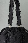 Shop_Amyra_Black Embroidery, Tassels Kohl Silk Bucket Bag _at_Aza_Fashions