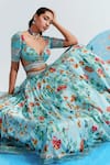 Shop_Mahima Mahajan_Blue Satin Organza Embroidered Floral Motifs Plunge Samara Print Lehenga Set _Online_at_Aza_Fashions