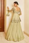 Shop_Awigna_Green Crepe Lining, Dupatta- Net, Peplum- Organza, Liana Pleated Lehenga Set_at_Aza_Fashions