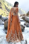 Shop_Paulmi And Harsh_Orange Tissue Sequins, Dabka, Moti, Zari V Neck Hand Embroidered Lehenga Set _at_Aza_Fashions