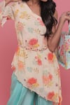 Seams Pret And Couture Off White Crepe Printed Floral Asymmetric Azalea Tunic And Dhoti Pant Set Online at Aza Fashions Seams Pret And Couture_Off White Crepe Printed Floral Asymmetric Azalea Tunic And Dhoti Pant Set _Online_at_Aza_Fashions