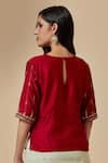 Shop_Anantaa by Roohi_Red Silk Chanderi Embroidered Floral Round Blouse _at_Aza_Fashions