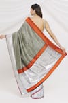 Shop_Resa by Ushnakmals_Black Satin Silk Woven Tanchoi Pattern Saree _at_Aza_Fashions