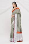 Buy_Resa by Ushnakmals_Black Satin Silk Woven Tanchoi Pattern Saree _at_Aza_Fashions