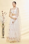 Buy_Samyukta Singhania_White Net Embroidered Sequin And Thread Work Floral & Polka Dot Lehenga Set _at_Aza_Fashions