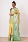 Buy_AHARIN INDIA_Yellow Pure Dharamavaram Silk Woven Floral Motifs V Saree With Velvet Blouse _at_Aza_Fashions