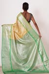 Shop_AHARIN INDIA_Yellow Pure Dharamavaram Silk Woven Floral Motifs V Saree With Velvet Blouse _at_Aza_Fashions