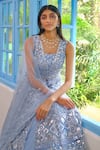 Aneesh Agarwaal_Blue Net Mirror, Thread, Foil Jacket V Neck Floral Embroidered Lehenga Set _Online_at_Aza_Fashions