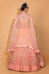 Shop_Neha Khullar_Peach Banarasi Organza Woven Floral Tiered Lehenga Set With Embroidered Cape _at_Aza_Fashions