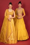 Buy_Neha Khullar_Yellow Banarasi Chanderi Woven Mirror Sweetheart Neck Tiered Lehenga Set _Online_at_Aza_Fashions