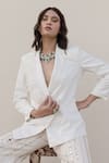 Neha & Tarun_White Poly Viscose Plain Lapel Collar Asymmetric Blazer And Pant Set_at_Aza_Fashions