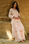 Buy_Akanksha Mago_Peach Net, Georgette Dori, Swarovski Round Irana Embellished Kurta Set _at_Aza_Fashions