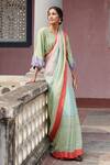 Buy_Kasturi Kundal_Green Shalini Linen Woven Saree_at_Aza_Fashions