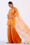 Buy_Devnaagri_Orange Linen Satin And Organza Dori, Sequins Round Embroidered Kurta Sharara Set_at_Aza_Fashions