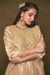 Shop_Surbhi Shah_Gold Pure Tissue Embroidery Mirror Notched Kurta Set  _Online_at_Aza_Fashions