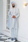 Shop_Contrast By Parth_Blue Raw Silk Glass Beads, Resham, Dabka Floral Embroidered Sherwani Set _at_Aza_Fashions