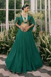 Buy Adi By Aditya Khandelwl Green Georgette Dori, Floral, Sequin, Zari V Neck Draped Crop Top And Skirt Set at Aza Fashions Buy_Adi By Aditya Khandelwl_Green Georgette Dori, Floral, Sequin, Zari V Neck Draped Crop Top And Skirt Set_at_Aza_Fashions