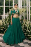 Shop Adi By Aditya Khandelwl Green Georgette Dori, Floral, Sequin, Zari V Neck Draped Crop Top And Skirt Set at Aza Fashions Shop_Adi By Aditya Khandelwl_Green Georgette Dori, Floral, Sequin, Zari V Neck Draped Crop Top And Skirt Set_at_Aza_Fashions