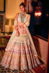 Buy_Reynu Taandon_Multi Color Soft Net Embroidered Sequins V Neck Bridal Lehenga Set _at_Aza_Fashions