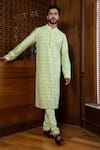 Buy_Darshika Menswear_Green Cotton Silk Embroidered Geometric And Floral Motifs Kurta Set _at_Aza_Fashions