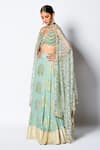 Buy_Rishi and Vibhuti_Green Georgette And Net Woven & Embellishment Floral Motifs & Sama Lehenga Set _at_Aza_Fashions