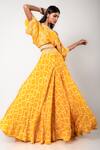 Buy_Nupur Kanoi_Yellow Crepe Polka Dots, Mirror And Swarovski Border Tie-dye Top & Lehenga Set_at_Aza_Fashions