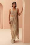 Buy_PARUL GANDHI_Gold Lycra Embellished Sequin Pleated Pre-draped Saree With Corset _at_Aza_Fashions